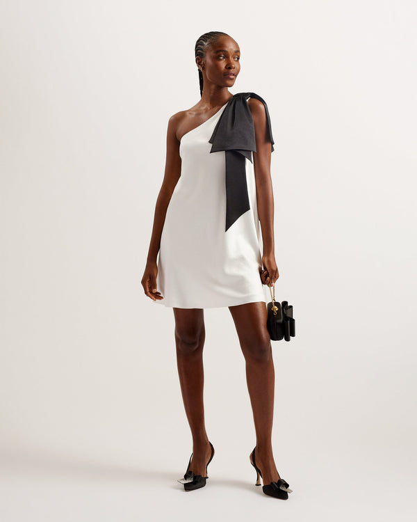 MIDORI-Dresses-Introducing the perfect party look. Featuring a one-shoulder design that's topped with an oversized bow, this satin mini dress exudes glamor. The A-line shift silhouette not only looks elegant, but it also leaves you room to get down on the dancefloor. Pair it with your favorite heels and you have a look that's perfect for the occasion. Mini dress One shoulder design Oversize bow embellishment Satin finish A-line shift silhouette Concealed side zip fastening Lydia is 5'10" / 1.77m and wears